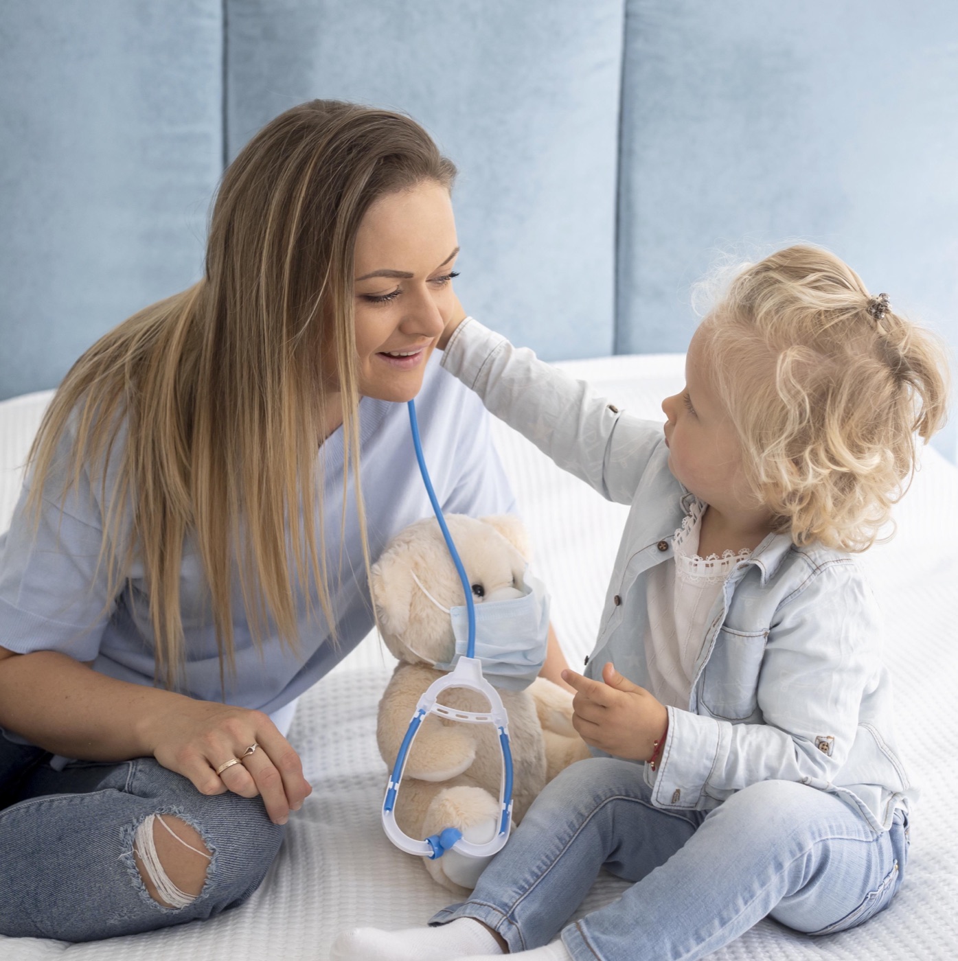 A young child at home during a nursing visit